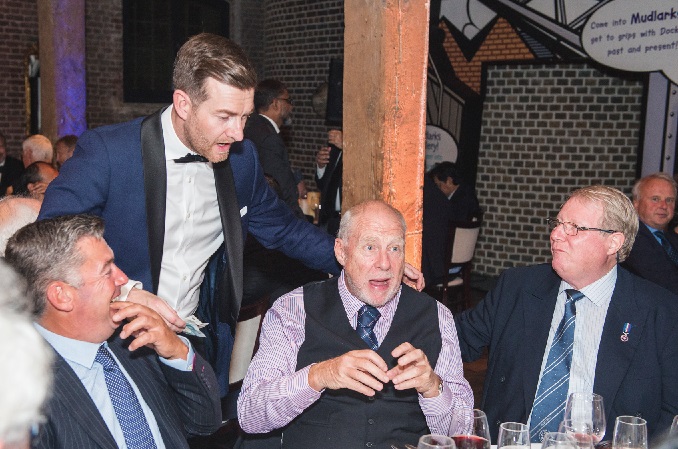 Magician, Kevin Starl, startles Clifford Parfett at dinner. Photo by Kirk Schwarz - www.kirkschwarz.co.uk