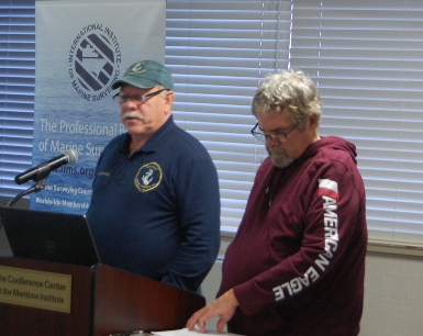 Capt Bill Weyant and Bob Kissinger discussing surveyor ethics