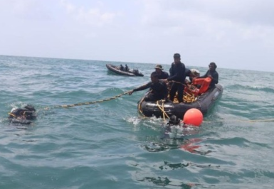 Divers at the scene of the sunken tug. Photo credit: Indian Ministry of Defence