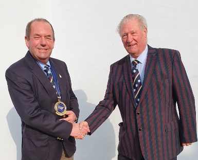 Geoff Waddington (pictured left) being presented with his President's medal by Paul Homer
