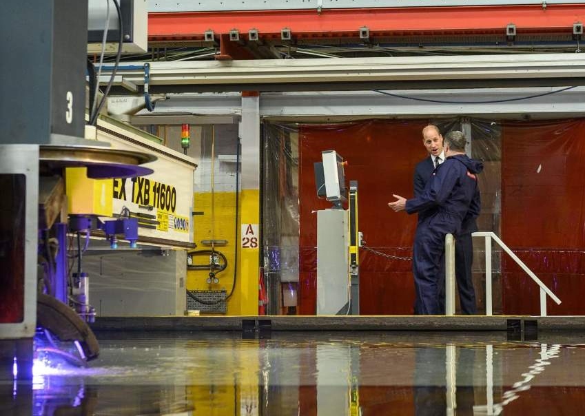 In support of the announcement of the new national shipbuilding strategy Prince William is pictured setting a plasma cutting machine to work on the first plate of steel for the third Type 26 frigate