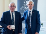 Chris Moody receiving his award from Sir Alan Massey