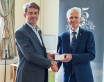 Nic Fieldhouse graciously accepting his award from Sir Alan